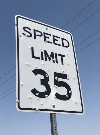 Speed Limit sign with bullet holes